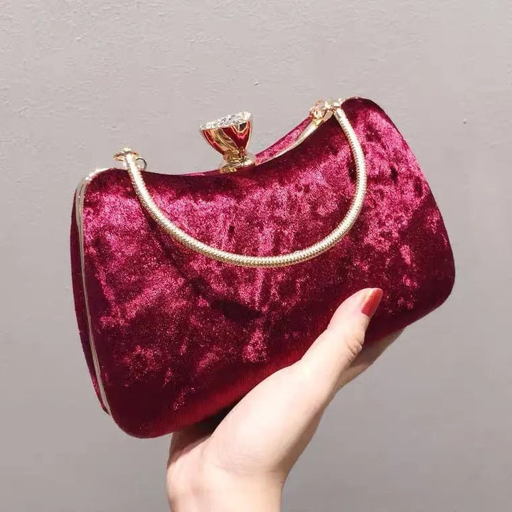 Sara | Wine Red Velvet Clutch with Decorative Closure & Metal Handle – Elegant Evening Bag for Women